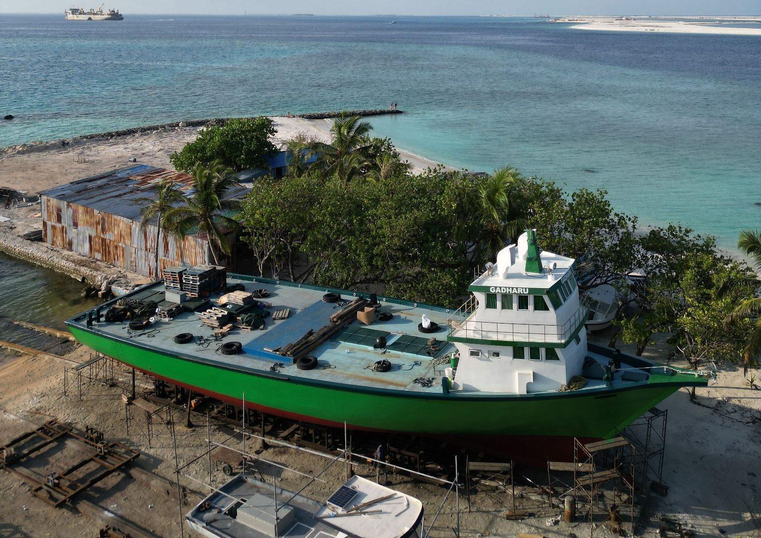 Supply vessel on a slipway with the lagoon behind